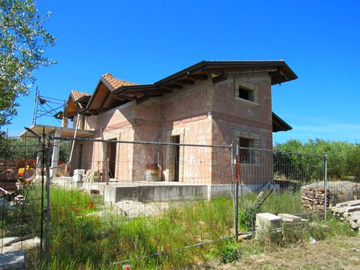 A rough, skeleton of a detached villa for sale with 500sqm of garden. 