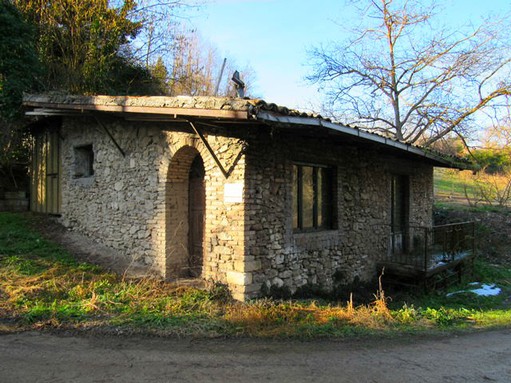 An isolated, stone mill over a fast running stream with garden and plenty of character.