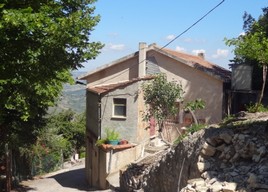 Two houses (stone)and a barn with garden. Onehouse is habitable. 3km to town. 1