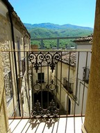 Two bedroom town house in original stone, in the old centre of this lively town, famous for its cookery school and location on Lake Bomba 1